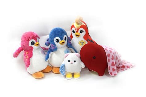 several stuffed animals are lined up together on a white background with one penguin and the ...