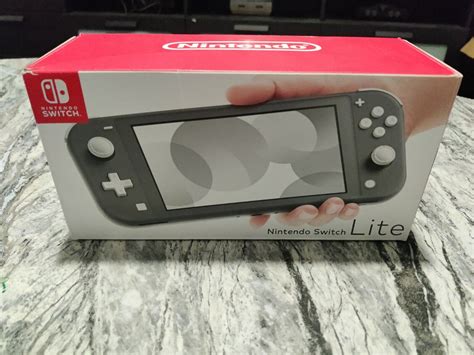 Mavin | Nintendo Switch Lite Gray Handheld Gaming System Console New ...