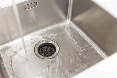 How to Prevent Your Kitchen Sink Disposal from Breaking (With ...