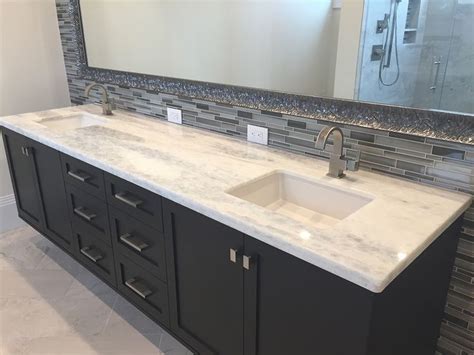 White Granite Double Vanity Sink With Modern Black Cabinets and Large ...