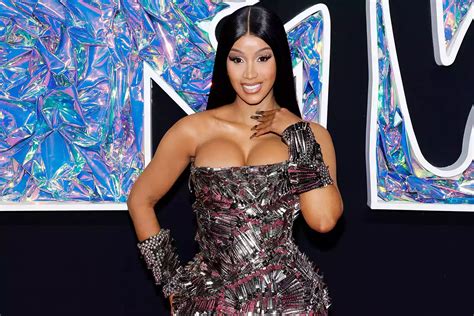 Cardi B Elevates the Fashion Game with Hair Clip-Adorned Gown and Arm Cuffs at the 2023 VMAs