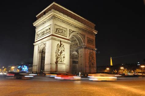 Arc De Triomphe at Night stock image. Image of light - 154556983