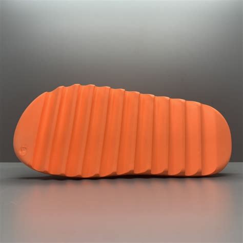 Yeezy Slides 'Enflame Orange' - SneakerCool.com