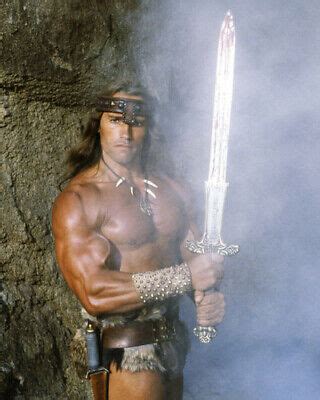 ARNOLD SCHWARZENEGGER holding sword as Conan The Barbarian 8x10 photo ...