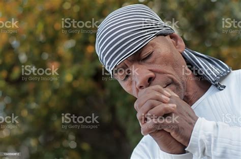 Man Praying With Hands Together Stock Photo Stock Photo - Download Image Now - African Ethnicity ...