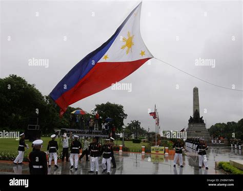 The Philippine flag is hoisted during flag raising ceremonies to celebrate the 150th birthday of ...