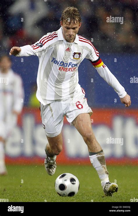 Simon Rolfes of Leverkusen makes an effort in the UEFA Cup round of 16's 2nd leg SV Hamburg v ...