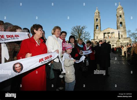 Thousands of fans gather for the funeral of singer Joe Dolan at the Cathedral of Christ the King ...