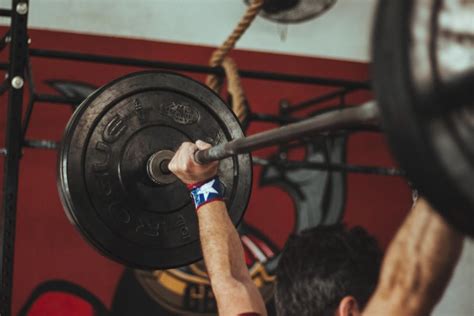 Woman Holding Exercise Ropes · Free Stock Photo