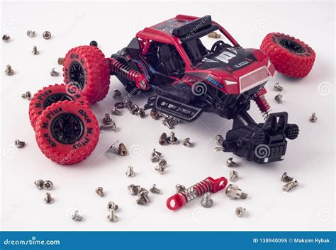 Disassembled Car and Scattered Parts. Broken Toy Editorial Image - Image of tire, power: 138940095