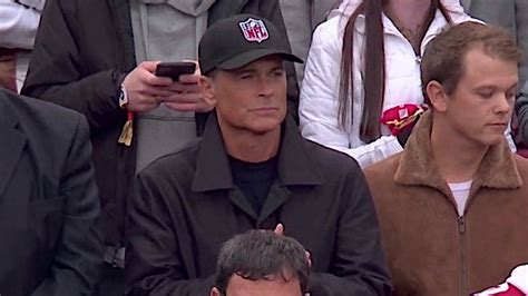 Rob Lowe’s Neutral ‘NFL’ Hat at 49ers Playoff Game Goes Viral | Heavy.com