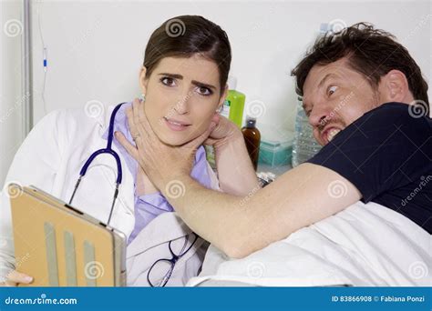 Angry Patient Trying To Kill Doctor in Hospital Stock Photo - Image of health, young: 83866908