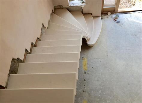 Simple but elegant design of a cantilevered stone staircaseCarvero