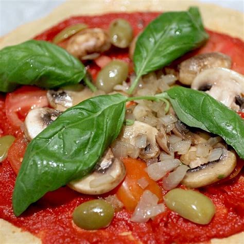 Gluten-free kosher pizza with a quinoa crust, with toppings that are beneficial and neutral for ...