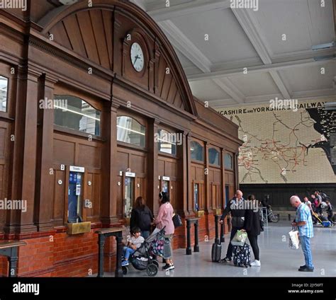 Manchester Victoria railway station interior showing original ticket office windows, Victoria ...