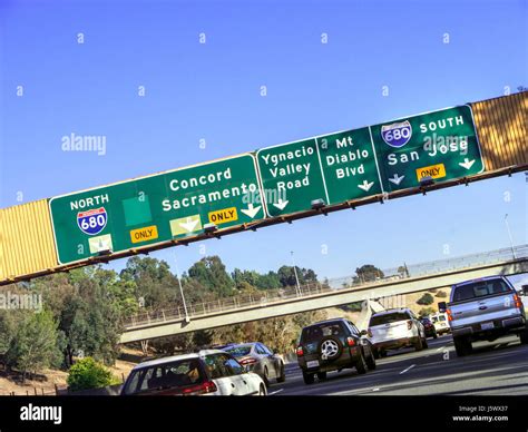 I-680- Commuter traffic on Interstate 680 passing under gantry direction signs, heading North to ...