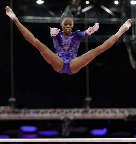 Gabby Douglas Gymnastics Photos - Sena Latashia