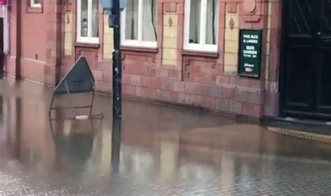 UK flooding: Watch as car is trapped in Rotherham town centre in savage ...