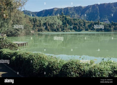 Scenery of sulphuric volcano lake Telaga Warna in Dieng plateau, Banjarnegara, Indonesia Stock ...