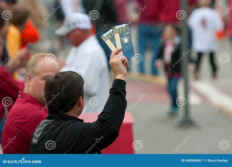 Man Tries To Sell Tickets for SEC Championship Game Editorial Photo - Image of risk, event: 48068041