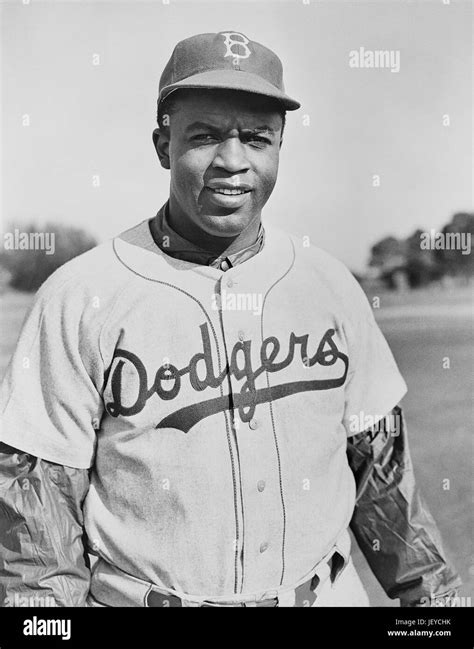 Jackie Robinson in his Brooklyn Dodgers uniform in 1950 Stock Photo ...