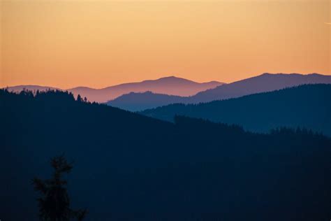 Silhouette of Mountain Ranges During Sunset · Free Stock Photo