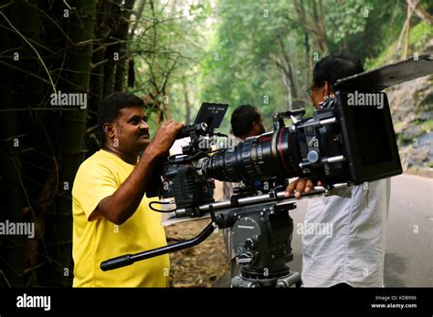 Video camera operator on nature background, film shooting spot Stock Photo: 163132626 - Alamy