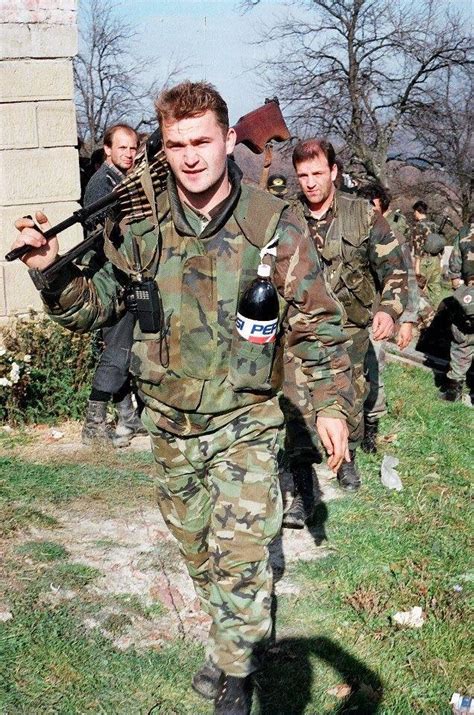 Enjoying a Pepsi. Serbian soldier in the Bosnian war with a Pepsi and a Zastava M84 GPMG : r ...