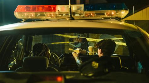 Police Officers Inside a Police Car · Free Stock Photo