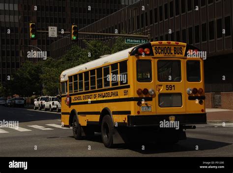 United States. Pennsylvania. Philadelphia. School Bus by Market street ...