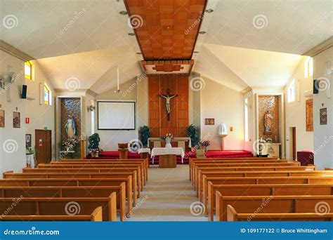 Roman Catholic Chapel, Interior with Empty Pews Editorial Photography - Image of cross, pews ...