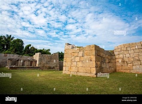 Massive stone walls which form the fortification of Hampi which was the capital of the ...