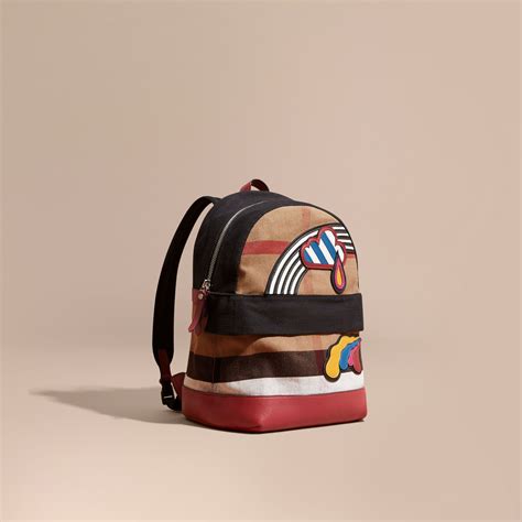 A backpack in Canvas check and leather from Burberry, appliquéd with a ...