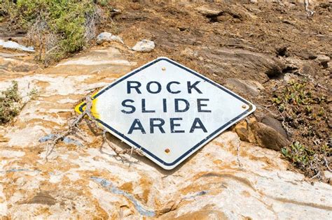 Close-up of a Warning Sign for Rock Slide Area Stock Photo - Image of ...