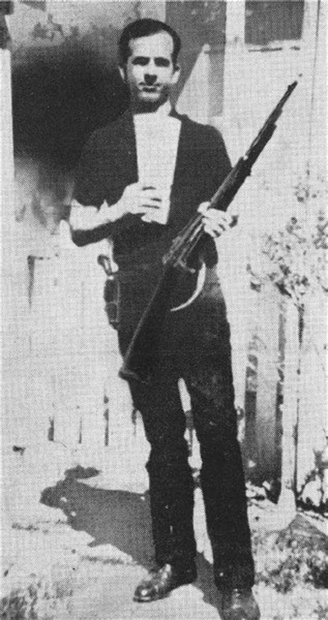 Lee Harvey Oswald holding the rifle he used to assassinate JFK, 3/31/1963 [317x600] : HistoryPorn