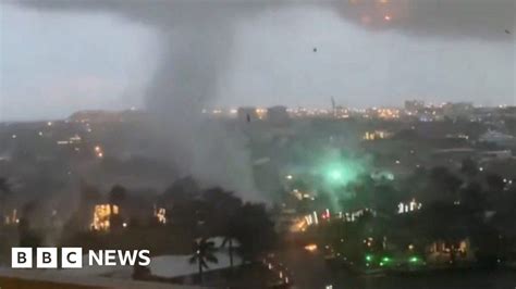 Sparks fly as tornado rips through Fort Lauderdale - BBC News