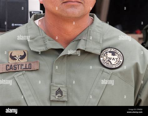 Close-up of uniform of member of Texas SWAT team. Texas department of public safety Texas Ranger ...