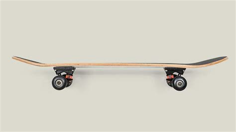 Free royalty image about Side view of a skateboard on off white background