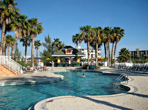 Swimming pool at the Holiday Inn and Suites Harbourside | Beachfront vacation, Beachfront ...