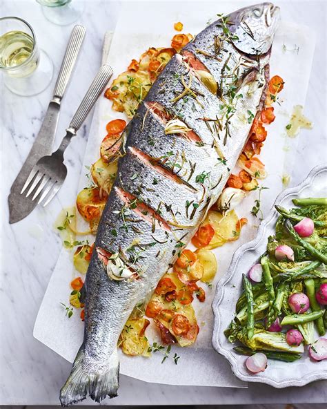 Whole roast salmon with spring vegetables recipe | delicious. magazine