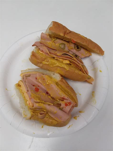 Olive loaf with cheese and mustard on a hoagie roll. : r/shittyfoodporn