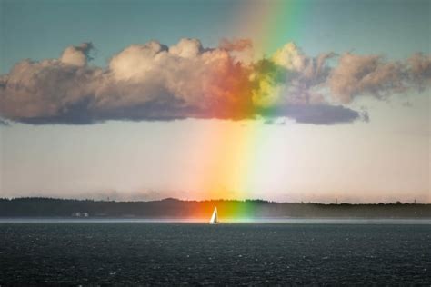 Photographer Captures Sailboat at the End of a Rainbow – Cartizzle