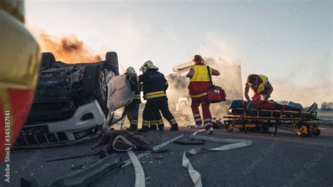 Paramedics and Firefighters Arrive On the Car Crash Traffic Accident ...