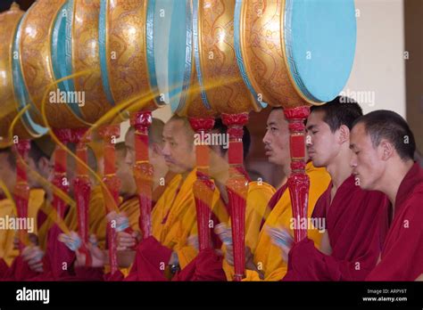 Tibetan Buddhist monks using traditional meditation instruments ...