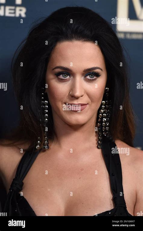 Katy Perry poses during her handprint ceremony after the premiere of ...