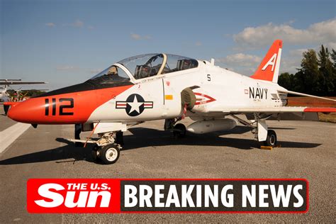 Two Navy training jets COLLIDE in explosive mid-air crash – but both ...