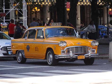 An old classic NYC taxi still running (58th Street & 5th Ave) | Old school cars, Taxi cab, Taxi