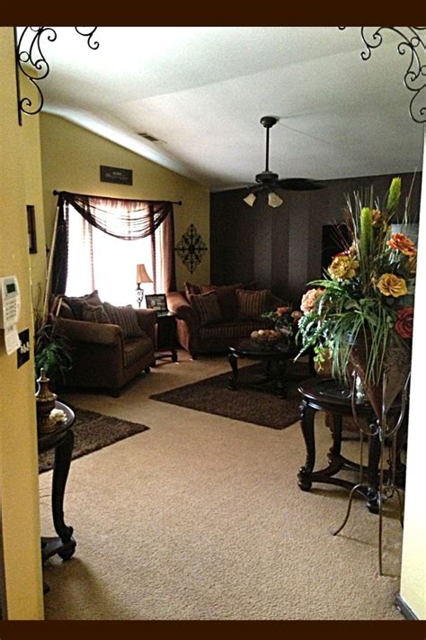 High ceilings brown wall accent decor | Wall accents decor, Brown walls ...