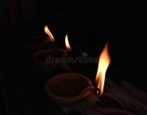 Lighting Deeyas during the Divali of Diwali Celebrations 2021 in ...