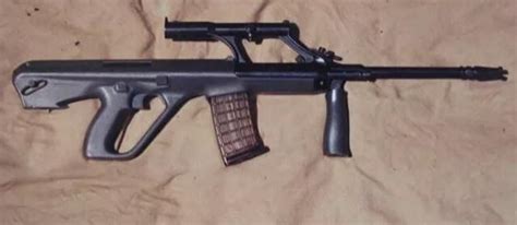 Came across unbullpup AUG in r/cursedguns. Can we have this as a special gun for April fools day ...